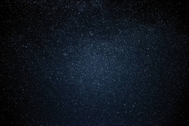 istock Night sky with stars and galaxy in outer space, universe background 1053075554