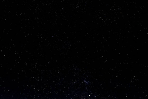 istock Night sky with stars and galaxy in outer space, universe background 1053075660