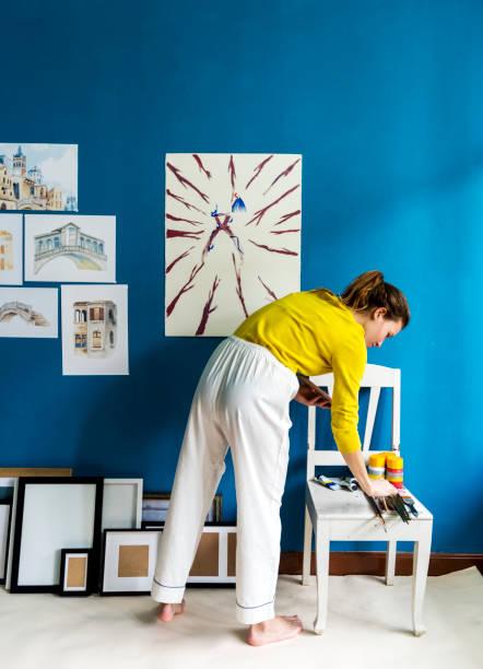 istock Young artist girl creaiting an artwork 1053078174