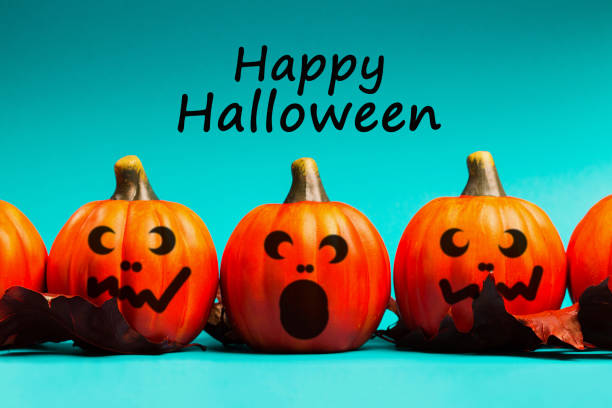 istock Halloween pumpkin jack o lantern decor with funny faces. 1053086766