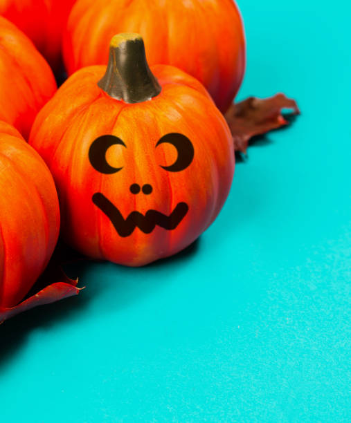 istock Halloween pumpkin jack o lantern decor with funny faces. 1053087714