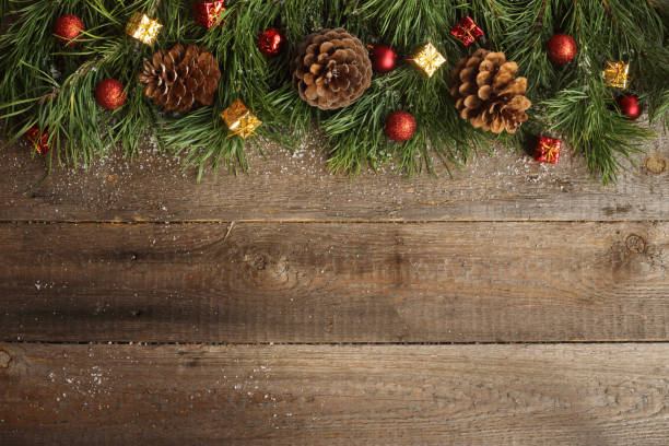 istock Christmas card on wooden background 1053089102
