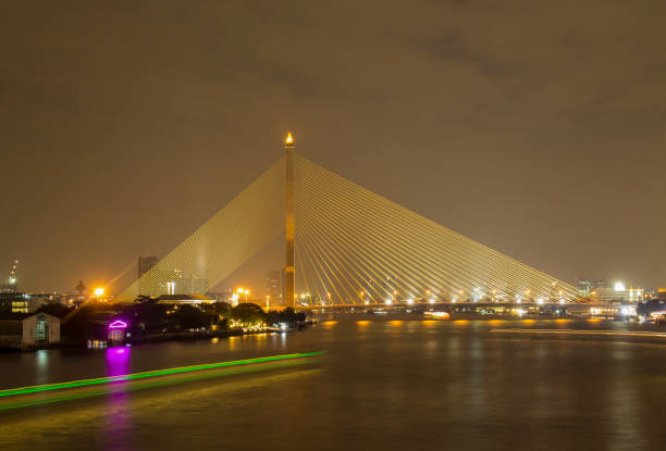 istock Bridge over Chao Phraya Light reflecting the beautiful water 1053094738