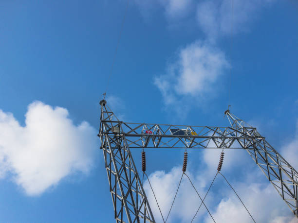 istock High voltage power transformer substation 115KV.high-voltage substation on blue sky background with switch. 1053097396