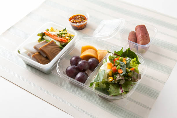 istock Lunch box food for diet with various fruits and side dishs 1053097660