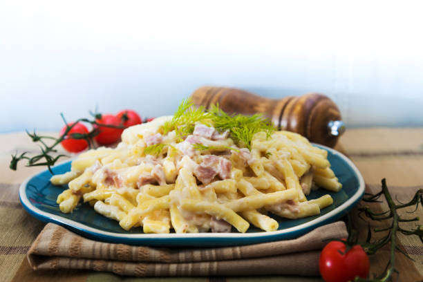 istock tasty Carbonara pasta on the table 1053104888