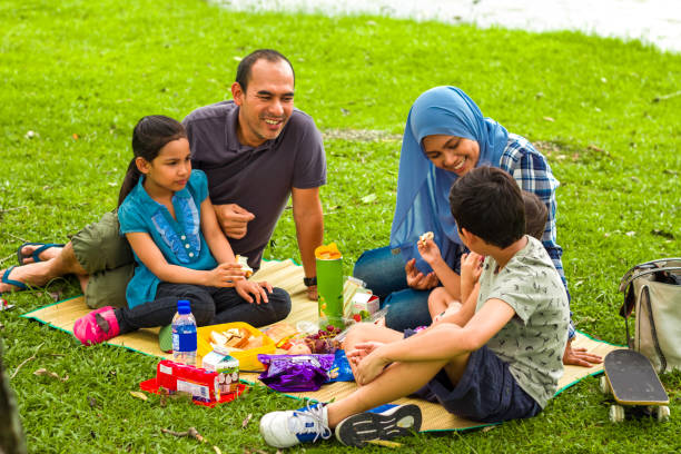 istock A family is picnic in the park. 1053104936