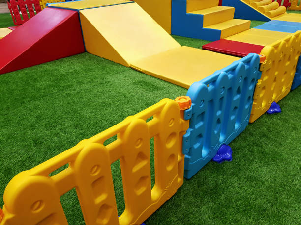 istock High Angle View of Colorful Playground with Plastic Fence 1053104964
