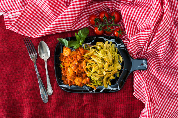 istock Pasta with Shrimp Dinner Dish on a the table 1053105104