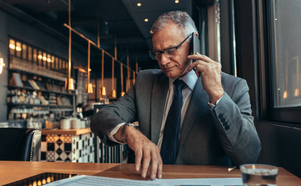 istock Senior businessman waiting for someone at cafe 1053110410