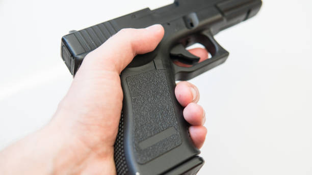 istock strikeball gun on the white backgroud. 1053114014
