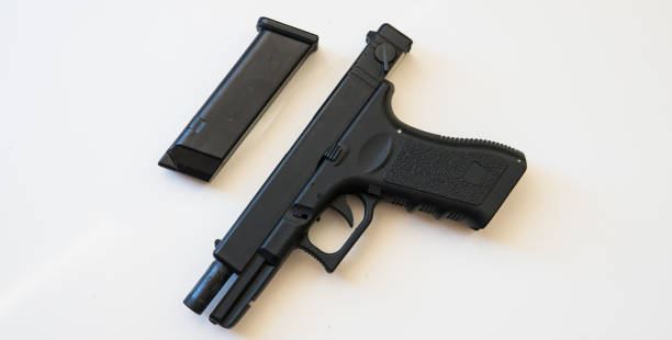istock strikeball gun on the white backgroud. 1053114106