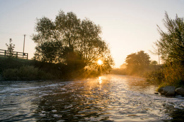 Misty Morning Sunrise Over The River Dearne stock photo