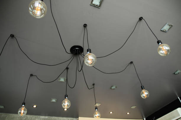 istock Decorative light bulb in cafe. Idea for shop decoration. 1053125380