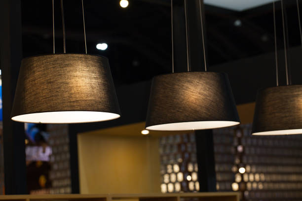 istock Chandelier. Chandelier hanging under ceiling 1053129546