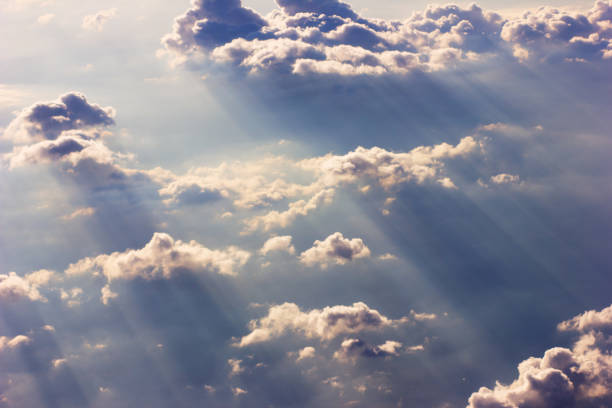 istock Background blue sky with a cloud behind the airplane window 1053133818