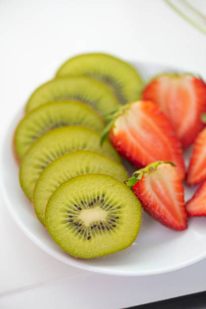 istock fresh Kiwi and Strawberry 1053134228