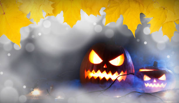 istock Halloween pumpkins in mist 1053138682