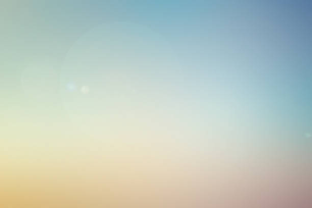 abstract blur multi color pastel background of skyline in early morning time with glow flare light effect for design concept abstract blur multi color pastel background of skyline in early morning time with glow flare light effect for design concept teal photos stock pictures, royalty-free photos & images