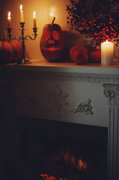 istock Candle shining inside Jack O Lantern in the darkness Halloween Celebration Halloween Halloween Horrors 1053147730