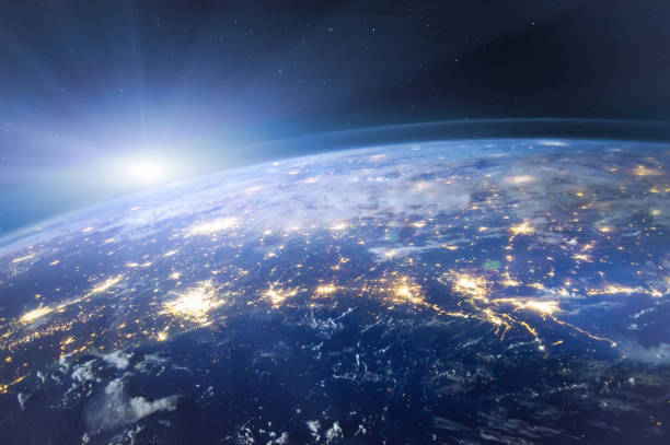 istock planet Earth seen from space, aerial view of night lights 1053149232