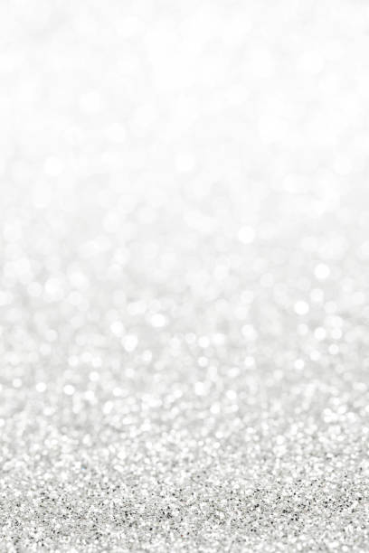 istock Glittery shiny lights silver abstract Christmas background 1053150840