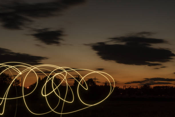 istock nice sunset with some light lines in the foreground, 1053151796