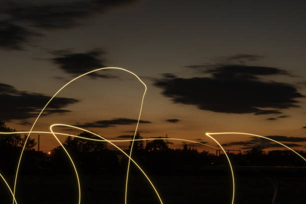 istock nice sunset with some light lines in the foreground, 1053151820