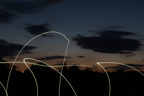 istock nice sunset with some light lines in the foreground 1053151836