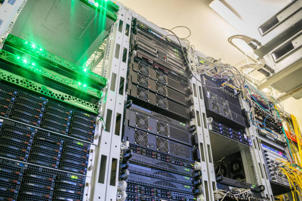 istock Access servers are located in a modern data center. Powerful computer equipment works in the server room rack. Cloud data storage services. Bottom view 1053151910