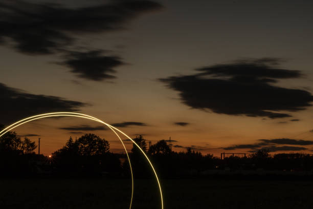 istock nice sunset with some light lines in the foreground, 1053151952