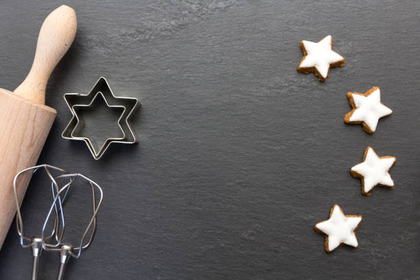 istock christmas bakery background with cinnamon star cookies 1053152264