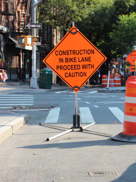 istock Bike Path Road Work Orange Warning Sign 1053154240