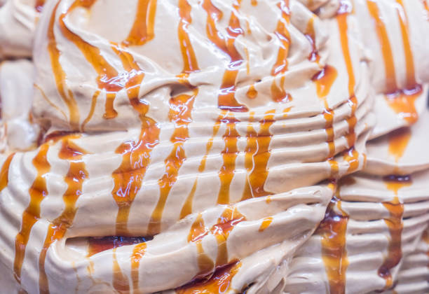 Vanilla ice cream with honey caramel close-up texture shot