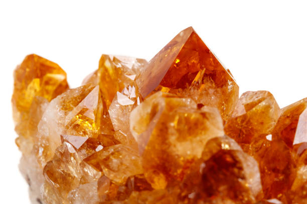 istock Macro mineral stone Citrine in rock in crystals on a white background 1053158310