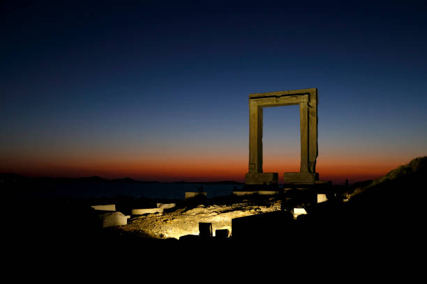 istock Portara, Apollo Temple's entrance at dusk 1053161924