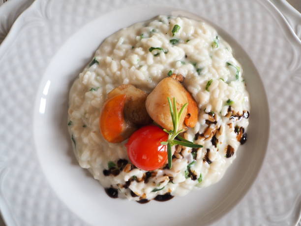 istock Risotto with seafood with cherry tomatoes and balsamic vinegar 1053168536