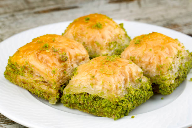 istock Turkish kitchen; Traditional delicious Turkish desserts; Baklava 1053179230