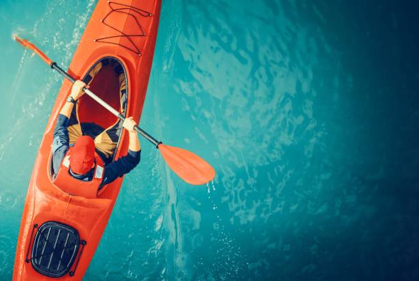 kayaker lake tour antenna - paddling foto e immagini stock