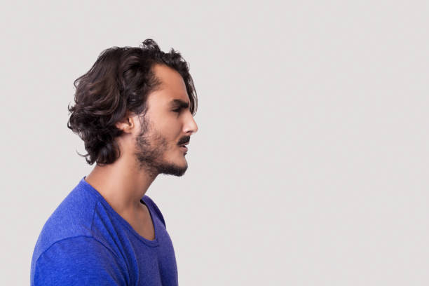 istock Portrait of a angry young man 1053181604