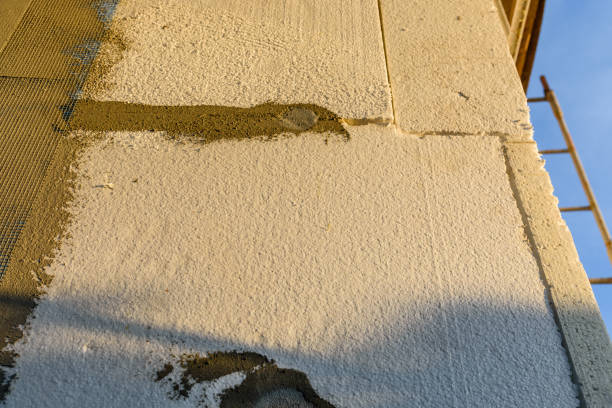 istock Insulation of the house with styrofoam. Energy saving concept 1053183930