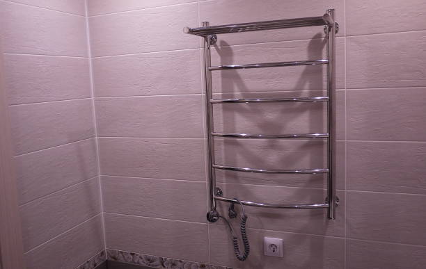 istock Electric heated towel rail to bathroom 1053192818
