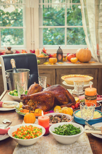 istock Traditional Stuffed Turkey with Side Dishes for Thanksgiving Day 1053200358