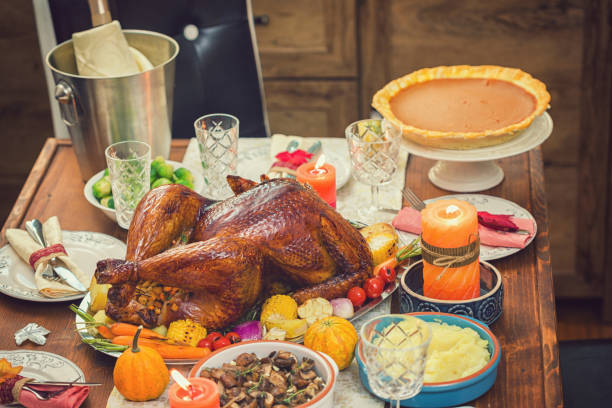 istock Traditional Stuffed Turkey with Side Dishes for Thanksgiving Day 1053203236