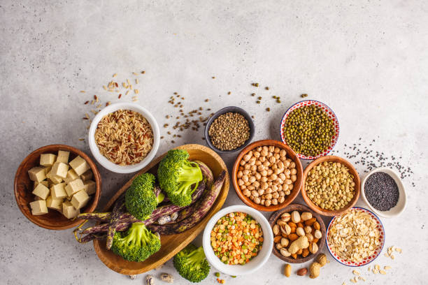 vegan protein source. tofu, beans, chickpeas, nuts and seeds on a white background, top view, copy space. - grain and cereal products imagens e fotografias de stock