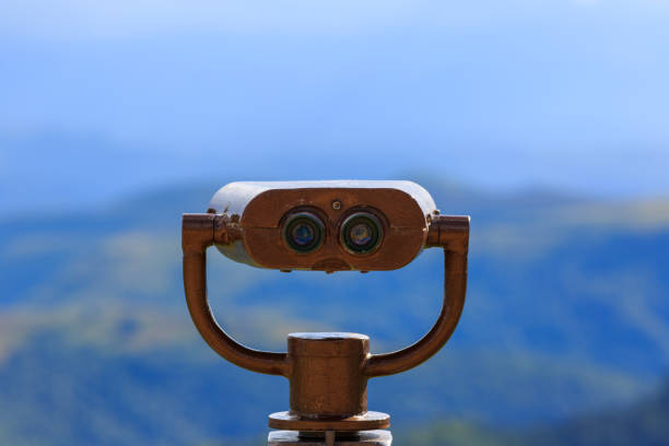 istock Binoculars on a viewing platform for observing flora, fauna and landscape. 1053223196