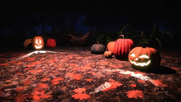 istock Jack-o-lantern pumpkins in autumn forest at night 1053223264