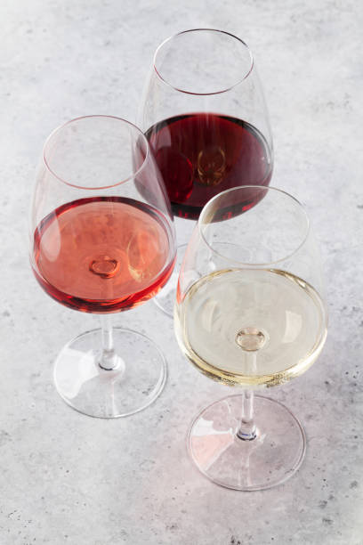 istock Red, rose and white wine glasses 1053227132