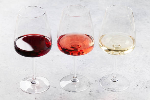 istock Red, rose and white wine glasses 1053227144