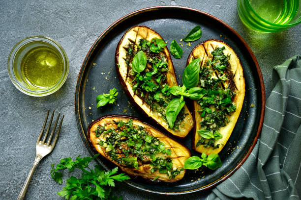 istock Eggplants roasted with garlic and herbs 1053228814